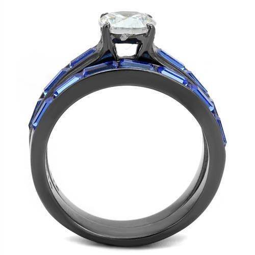 Stunning IP gun color engagement ring featuring a sparkling center stone and blue accent details