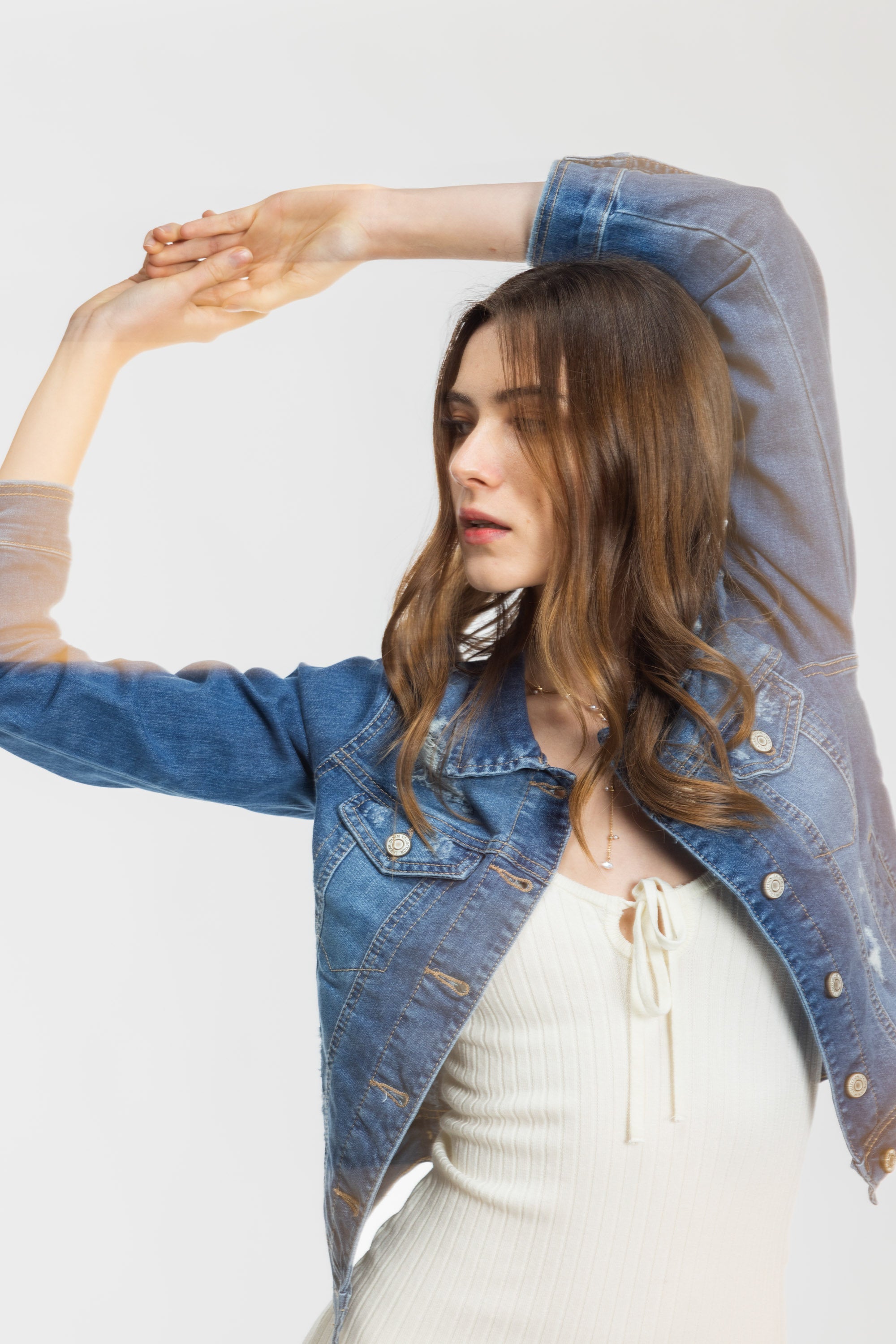 Women's denim jacket in classic blue, perfect for casual outings