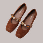 Brown suede jane mary shoes with decorative buckle accents