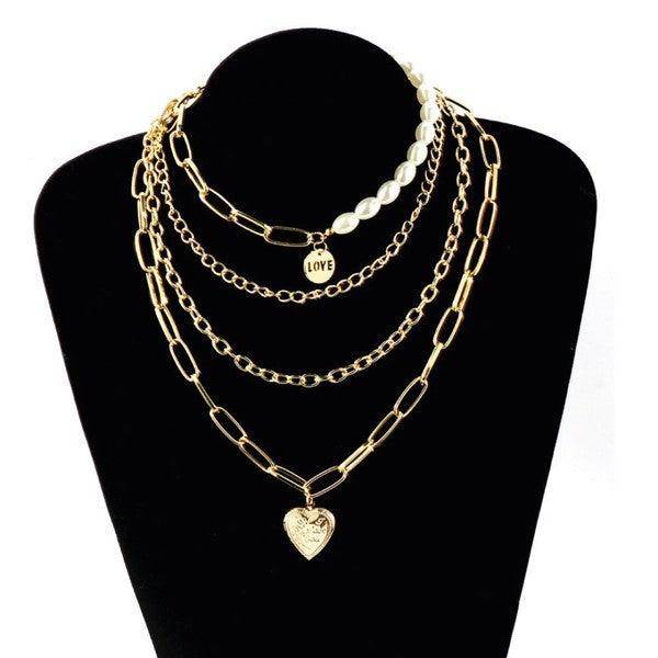 ClaudiaG Collection jester necklace for women featuring layered gold chains and pearl accents