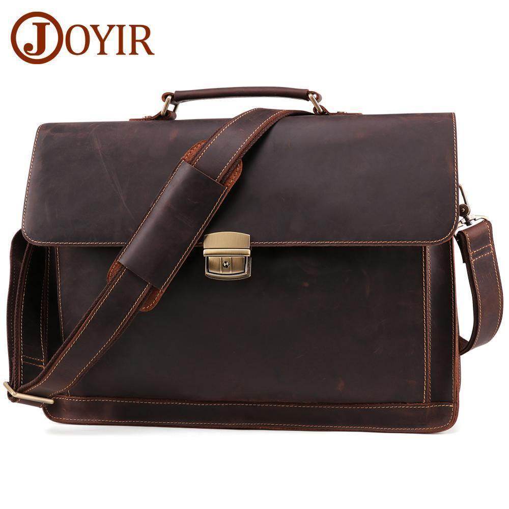 Vintage leather mens briefcase with a sturdy handle and adjustable shoulder strap for professional use