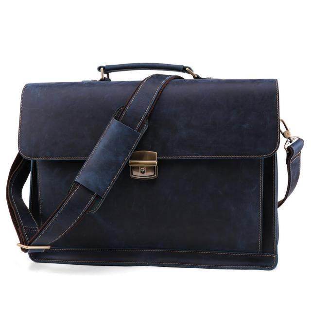 Vintage leather mens briefcase in dark blue with adjustable strap and brass lock closure