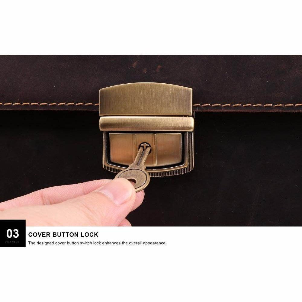 Close-up of the cover button lock on a vintage leather mens briefcase for enhanced security and style