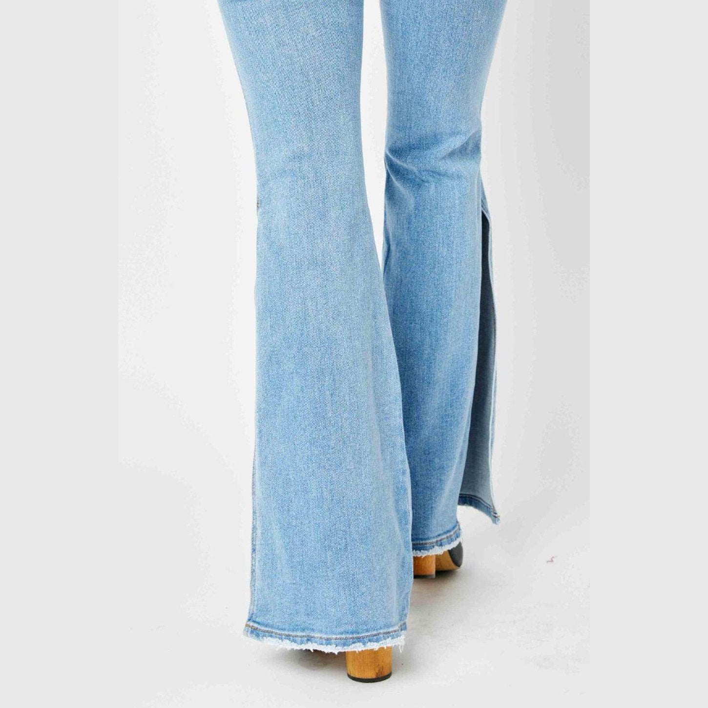 Judy Blue mid rise flare jeans in light blue denim with stylish side slits for a trendy look