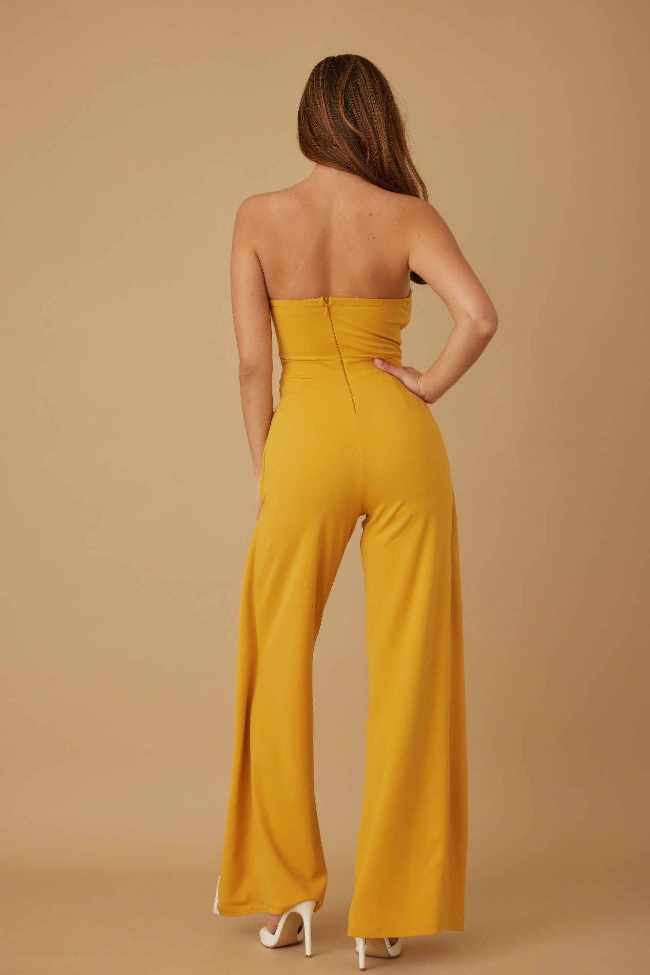 Yellow strapless jumpsuit for women with wide legs and a fitted bodice from VacationGrabs