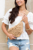 Stylish khaki sling bag vacation with intricate macrame design, perfect for casual outings