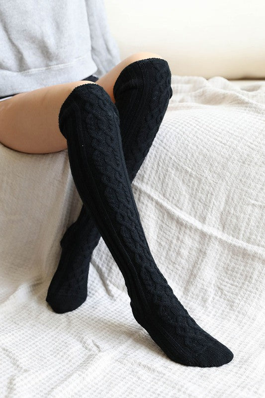 Leto Accessories knee high cable knit socks in black, perfect for warmth and style during colder months