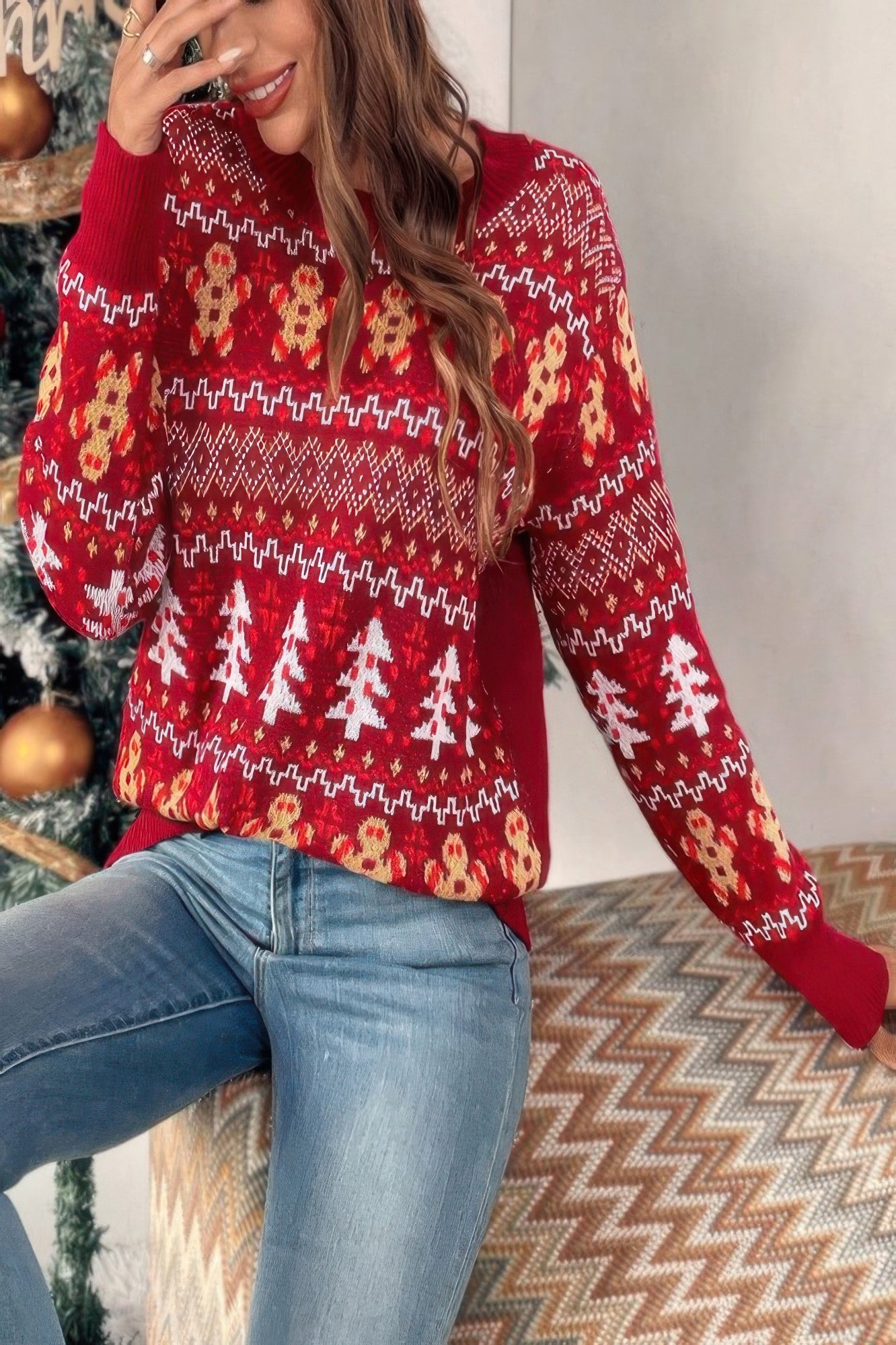 Cozy knit Christmas sweater for women in red with festive patterns and elegant design