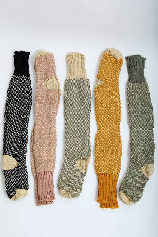 Collection of Leto Accessories knitted lounge socks in various colors for cozy home wear
