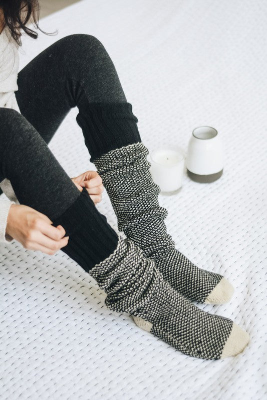 Cozy Leto Accessories knitted lounge socks in a stylish black and cream pattern for ultimate comfort