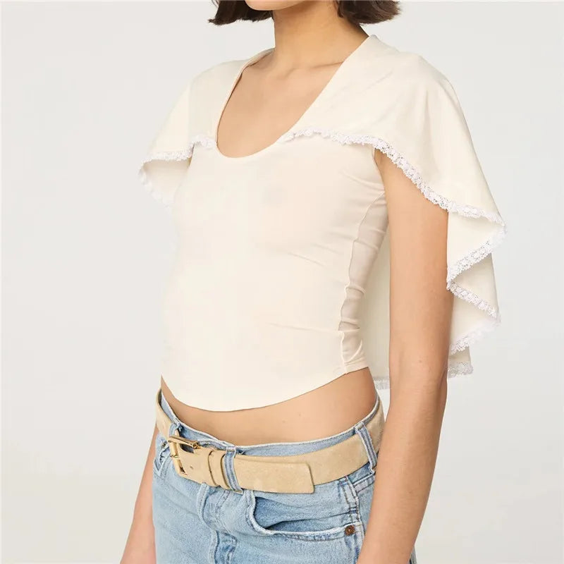 Women's ivory top with lace and trim, perfect for summer outings