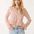Women's pink peplum blouse with lace details for casual outings