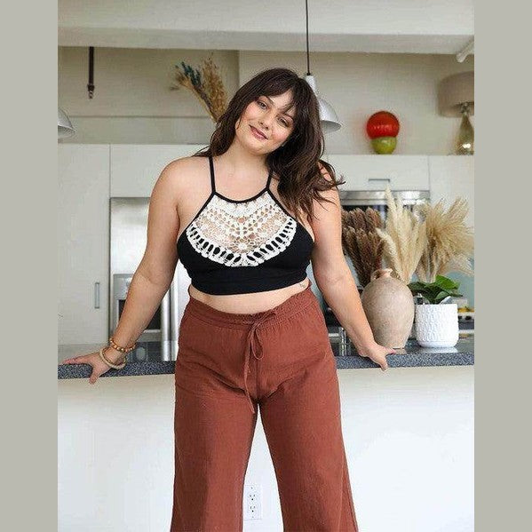 Leto Accessories lace high neck top women in black with intricate detailing, styled with brown pants