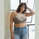 Leto Accessories lace high neck top women in brown with a crochet design, styled with high-waisted jeans