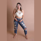 Stylish lace high neck top women paired with distressed jeans for a trendy summer look