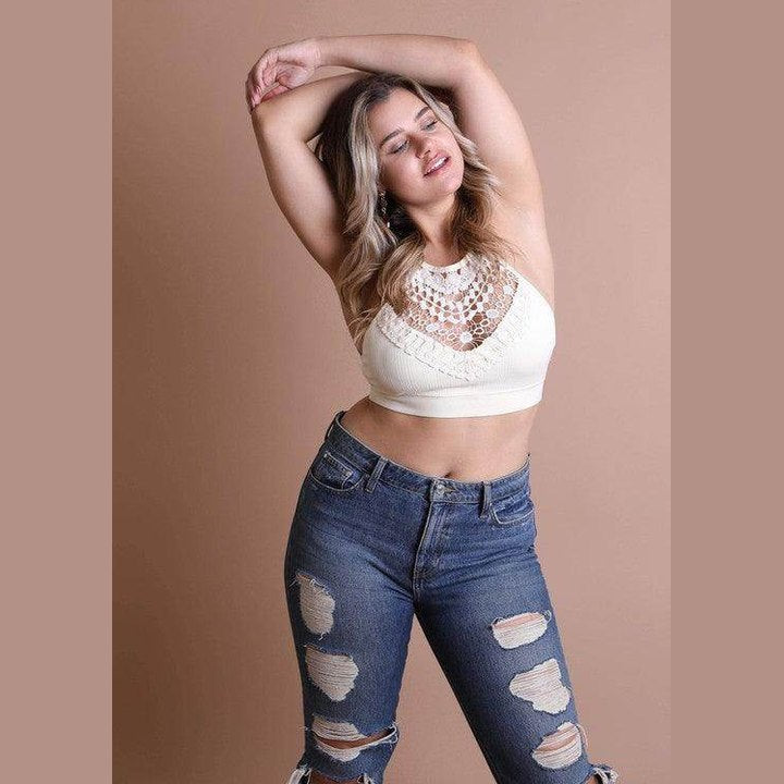 Stylish lace high neck top women paired with distressed jeans for a fashionable look