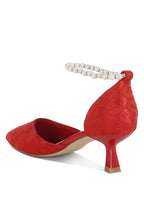 Red lace kitten heel sandals with a pearl ankle strap for elegant outings