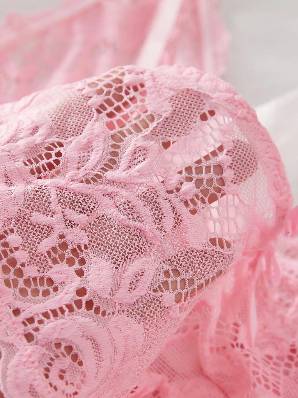 pink lace sleepwear, delicate floral design, perfect for relaxing at home