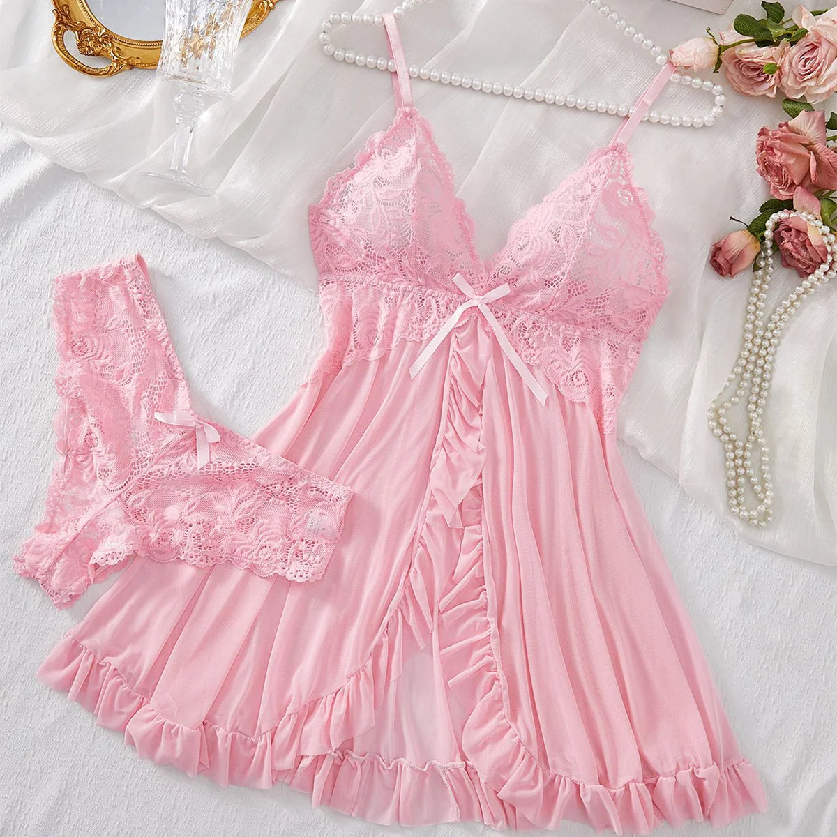 Pink lace sleepwear set with a flirty babydoll and matching panties