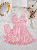 Pink lace sleepwear set with frills, ideal for a romantic night