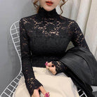 Elegant black lace top for women featuring a high neckline and long sleeves by VacationGrabs