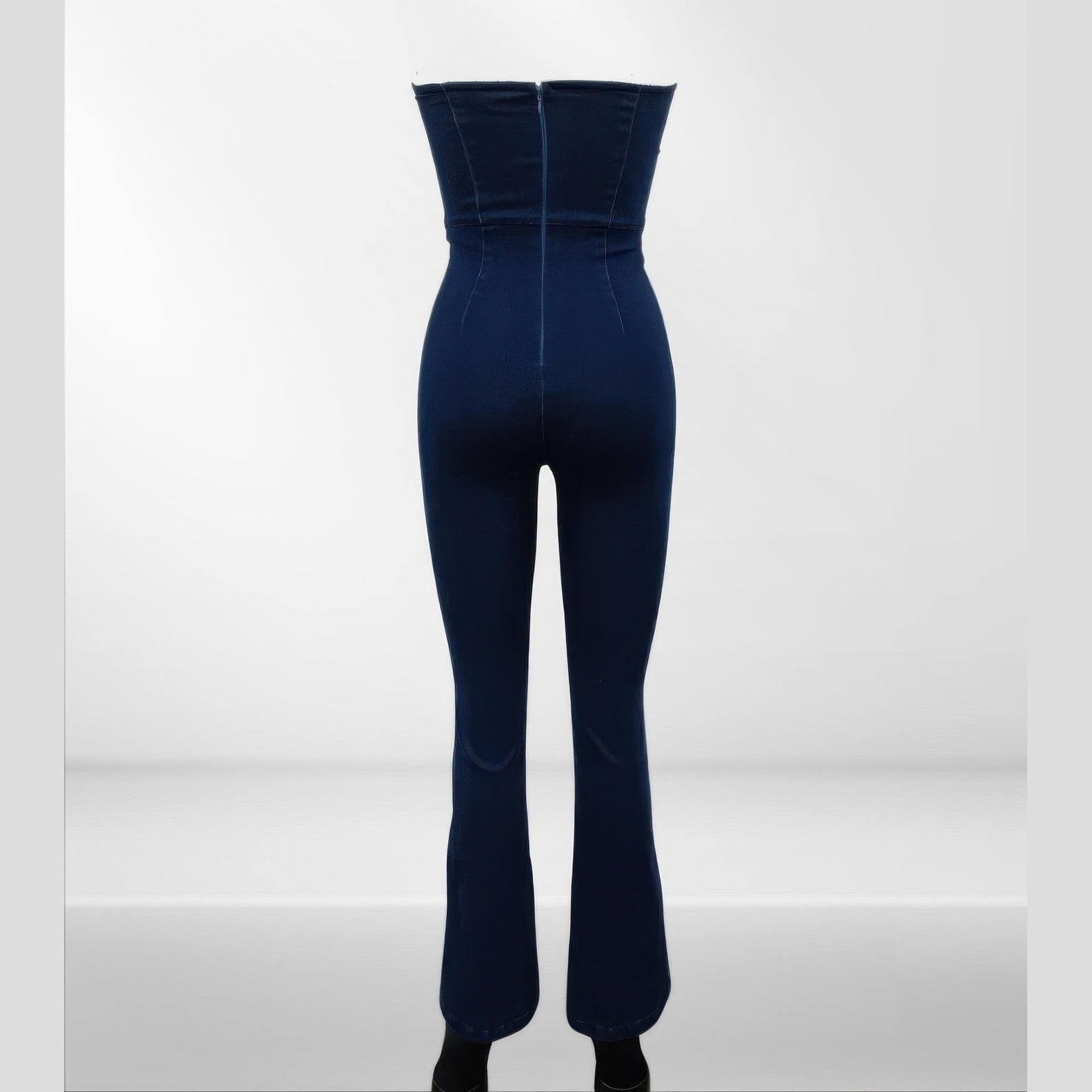 Back view of VacationGrabs lace up denim jumpsuit with a fitted design and flared legs