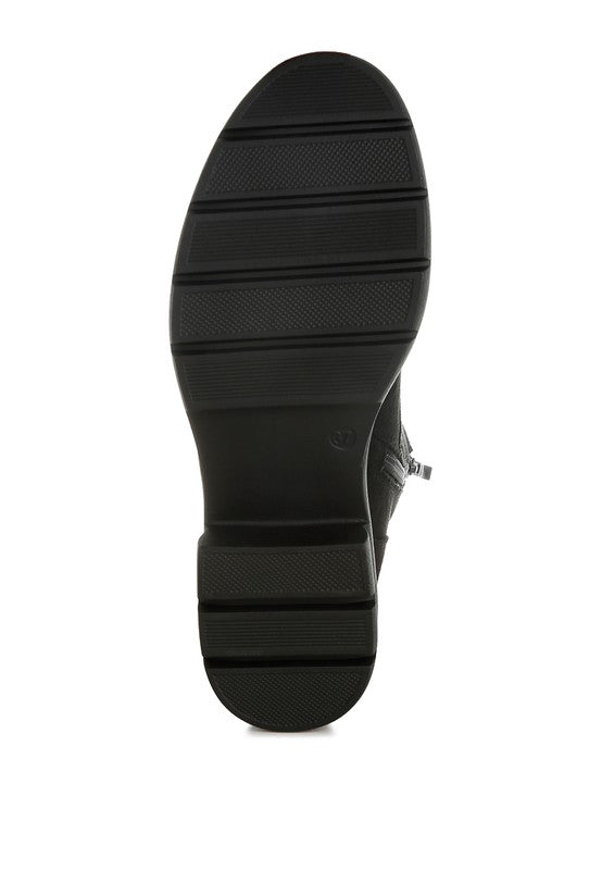 Sole of Rag Company lace up high ankle boots featuring a durable textured design for stability