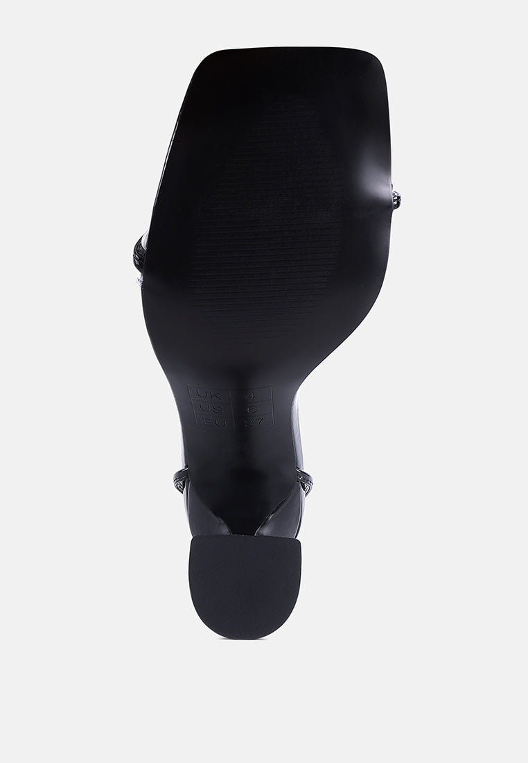 Sole view of London Rag International women's lace up spool heel sandals for stylish comfort and support