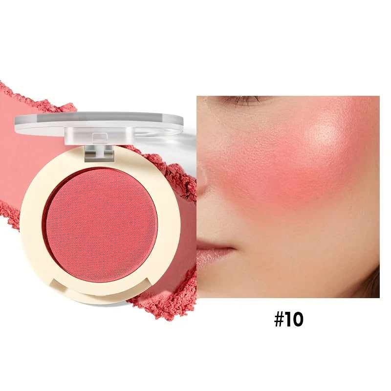 Blush powder in soft pink for a natural glow on cheeks