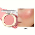 Blush powder in soft pink shade for a natural cheek glow