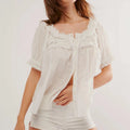 Ladies boho top in white, lightweight fabric, perfect for summer outings
