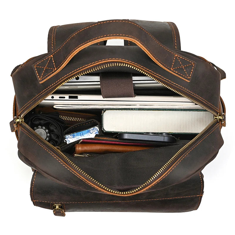 Brown leather laptop backpack with spacious interior for devices and essentials