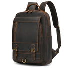 Brown leather laptop backpack with multiple pockets for work and travel