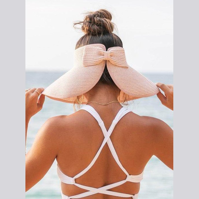 Aili's Corner large brim bow beach hat in soft pink with a stylish design, perfect for sunny days at the beach