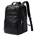 Large leather travel backpack with multiple pockets for organization and comfort on trips