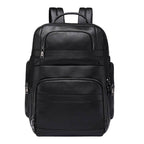 Large leather travel backpack with multiple compartments and adjustable straps for convenience
