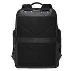 Large leather travel backpack with multiple pockets and padded straps for comfortable carrying