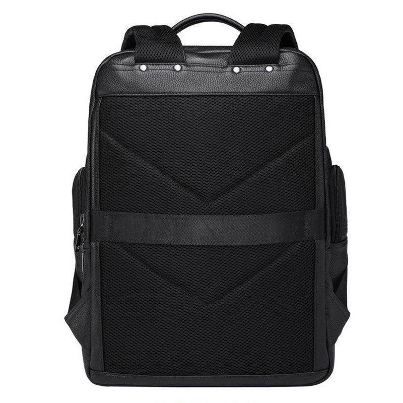 Large leather travel backpack with multiple pockets and padded straps for comfortable carrying