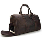 Large leather travel bag by VacationGrabs with a separate compartment for shoes and sturdy handles