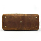 Large leather weekend bag from VacationGrabs with durable stitching and brass feet for stability