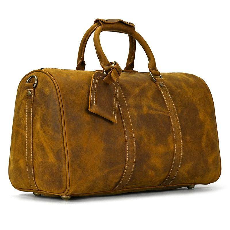 Large leather weekend bag from VacationGrabs with sturdy handles and a spacious interior for travel
