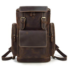 Durable brown leather duffel with multiple compartments, a large travel bag for men