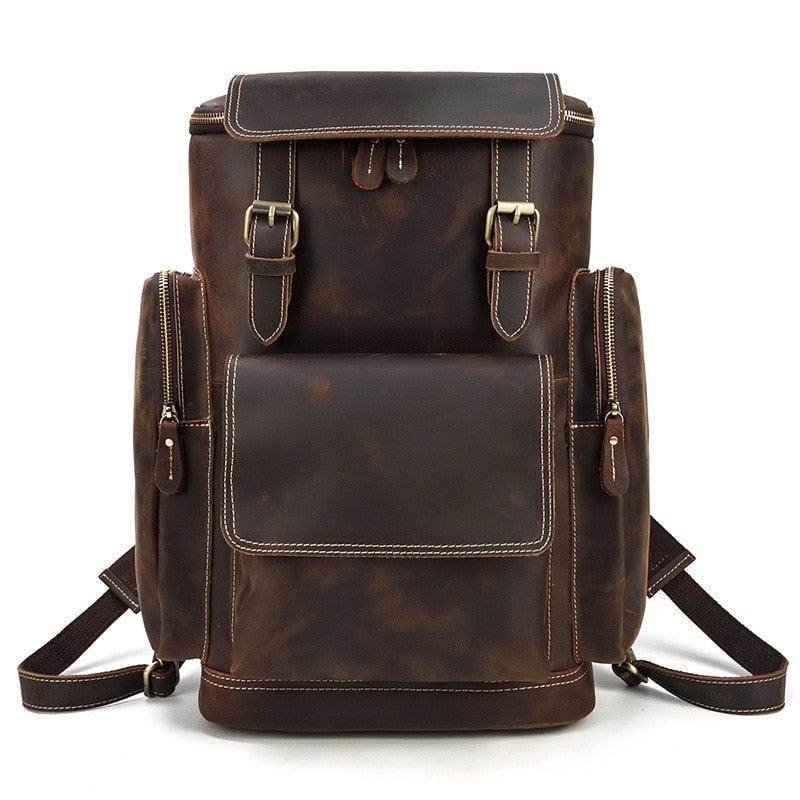 Durable brown leather duffel with multiple compartments, a large travel bag for men