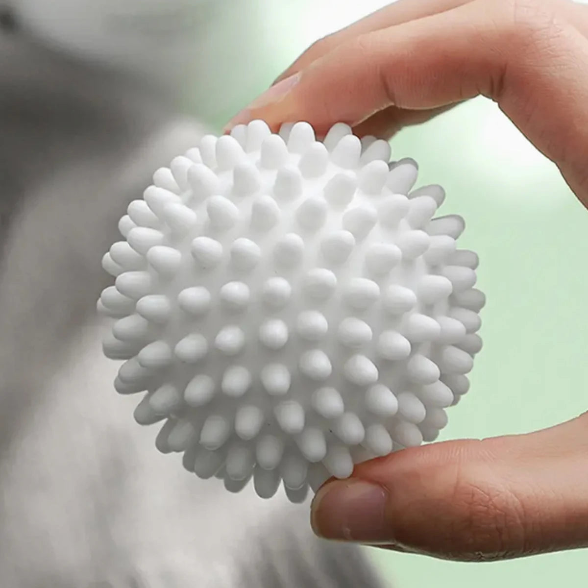 White laundry hair removal ball for pet hair in washing machines
