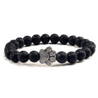 Lava stone pet bracelet featuring a paw print charm, perfect for pet lovers and stylish men