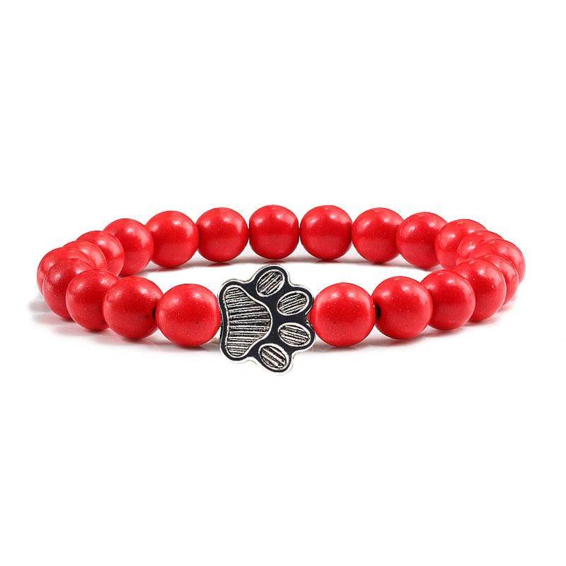 Red lava stone pet bracelet with a paw print charm for dog lovers