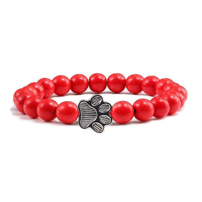 Red lava stone pet bracelet with a paw print charm for pet lovers