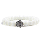 Lava stone pet bracelet in white featuring a stylish paw design for pet lovers
