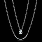 VacationGrabs layered chain pendant with cubic zirconia in silver featuring multiple chains and a sparkling drop design