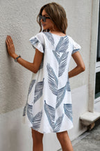 Women's leaf print ruffle dress from VacationGrabs with short sleeves and a relaxed fit